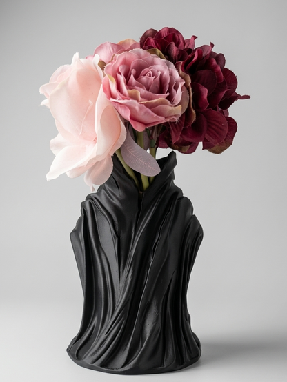Decorative vase shaped like a classical bust with flowers on a gray background