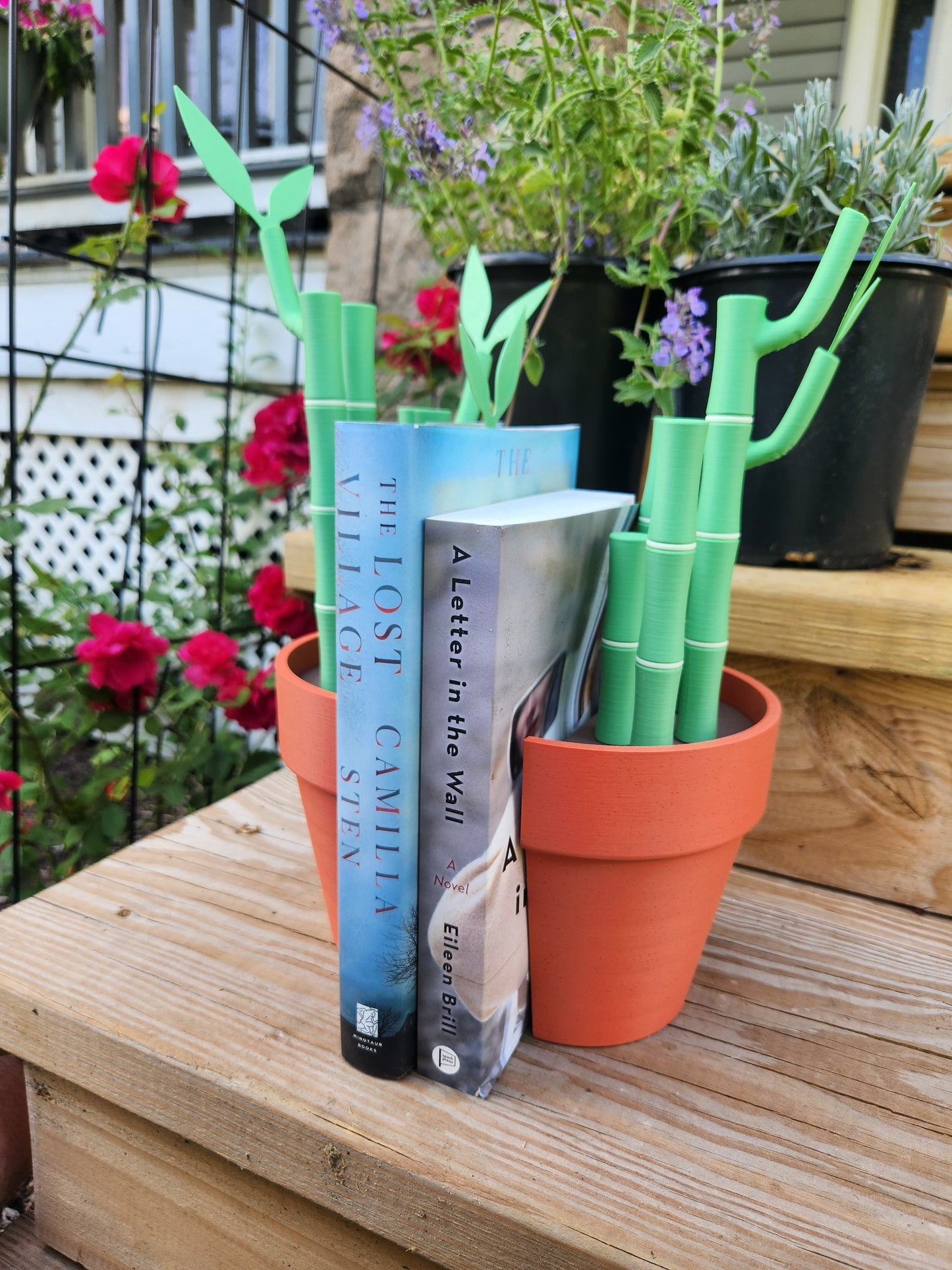 Bambookends -- bambu plant desk organizer or book ends with pens, highlighters, sticky notes, and book marks