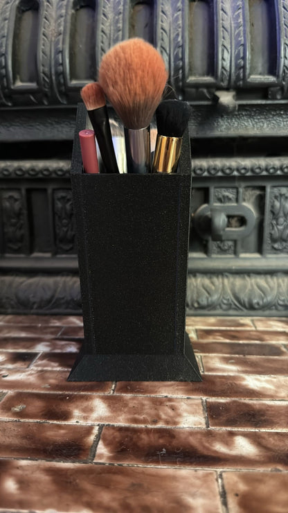 spider web makeup or pen holder